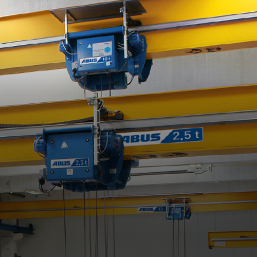 ABUS enkelspårig löpvagn av modell E för kompakt materialhantering och effektiv kranteknik inom industrin.